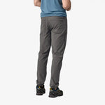 Patagonia Men's Quandary Pants in Forge Grey shown from behind on model