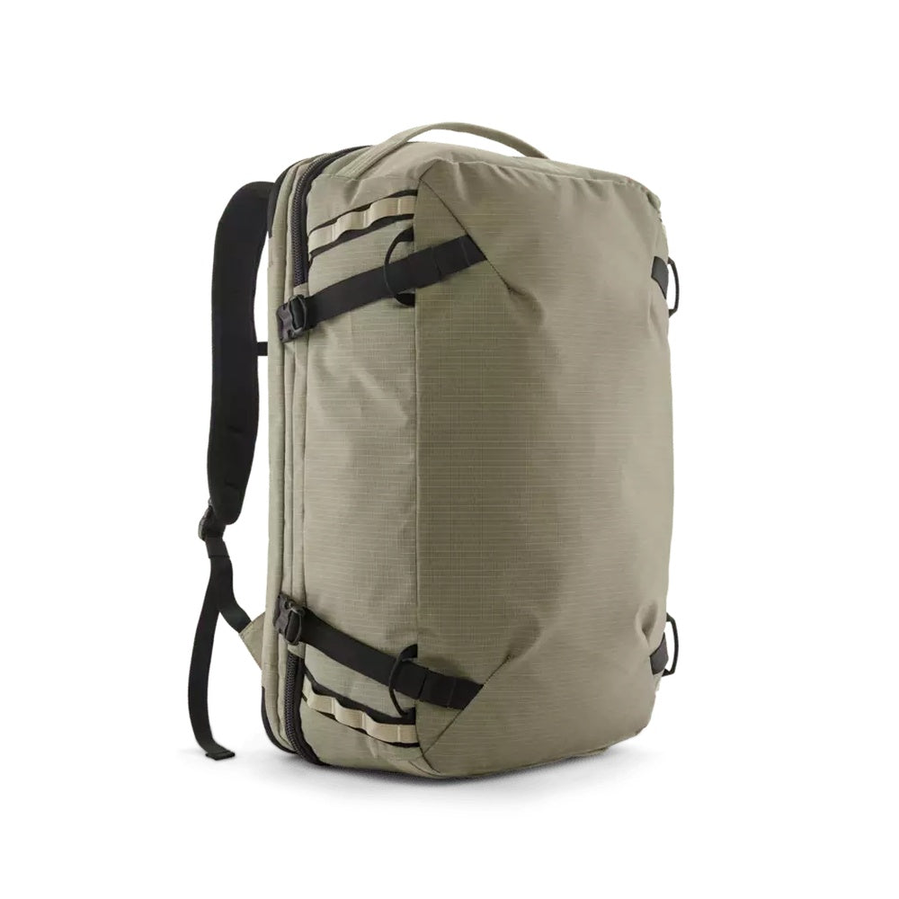 Patagonia Black Hole MLC travel backpack in Weathered Stone tan colorway, side angle view