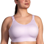 Brooks Dare Scoopback Sports Bra in light purple worn by female model on white background