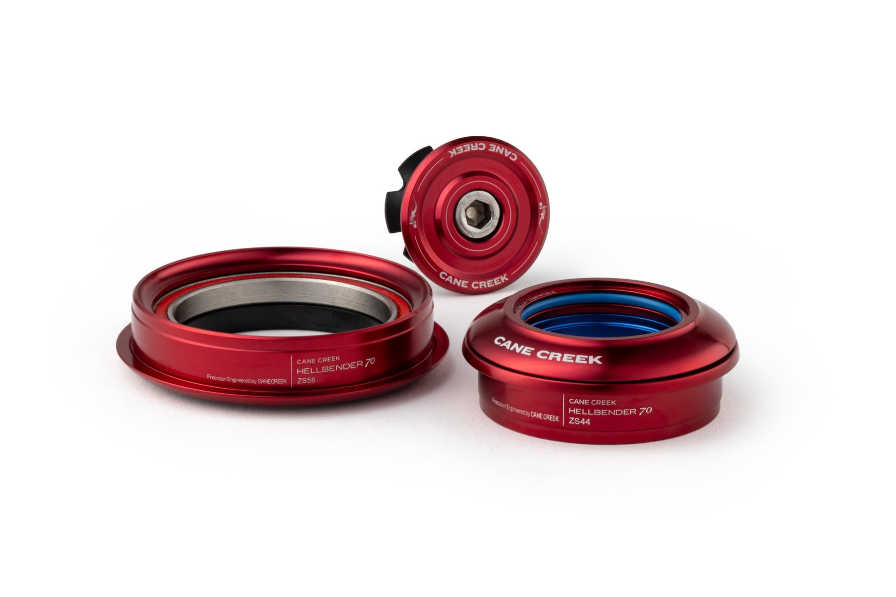 Cane Creek Hellbender 70 headset components in red anodized finish on white background
