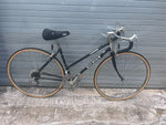 1980s Raleigh Capri 410 road bike in gloss black, full side view