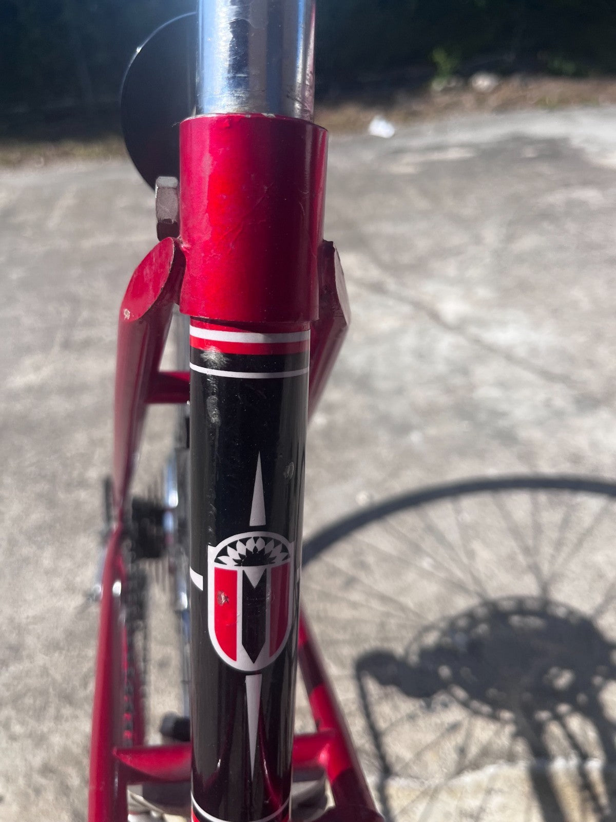 Matsuri head badge on the red head tube of the vintage FUNdamental Mixte bike