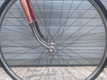 Drop bars with safety brake levers on vintage French mixte road bike