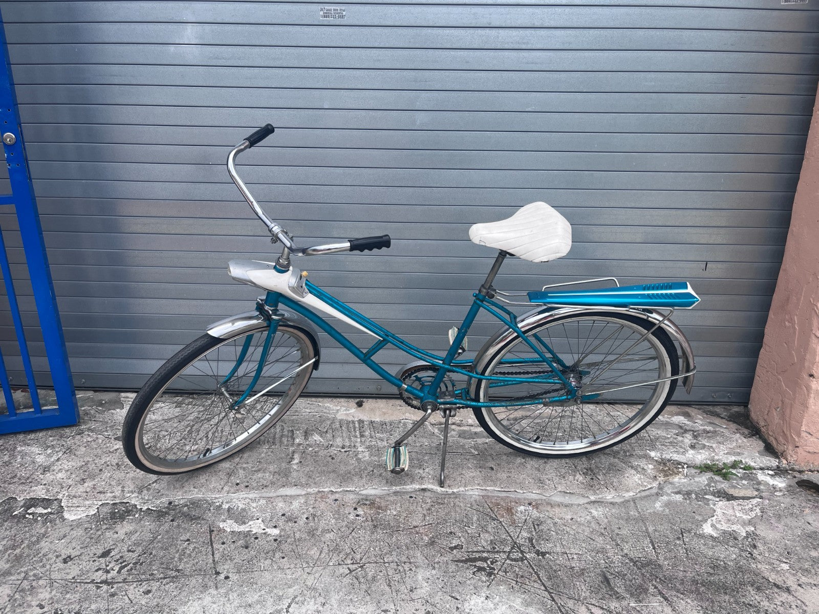 Chrome tank and space-age styling detail on 1960s Sears Spaceliner bicycle
