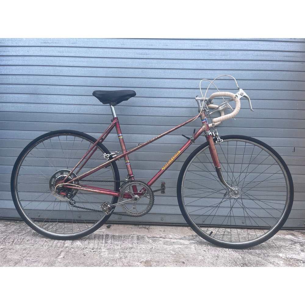 Vintage 1975 France-Loire Mixte road bike in metallic cherry red, full side view