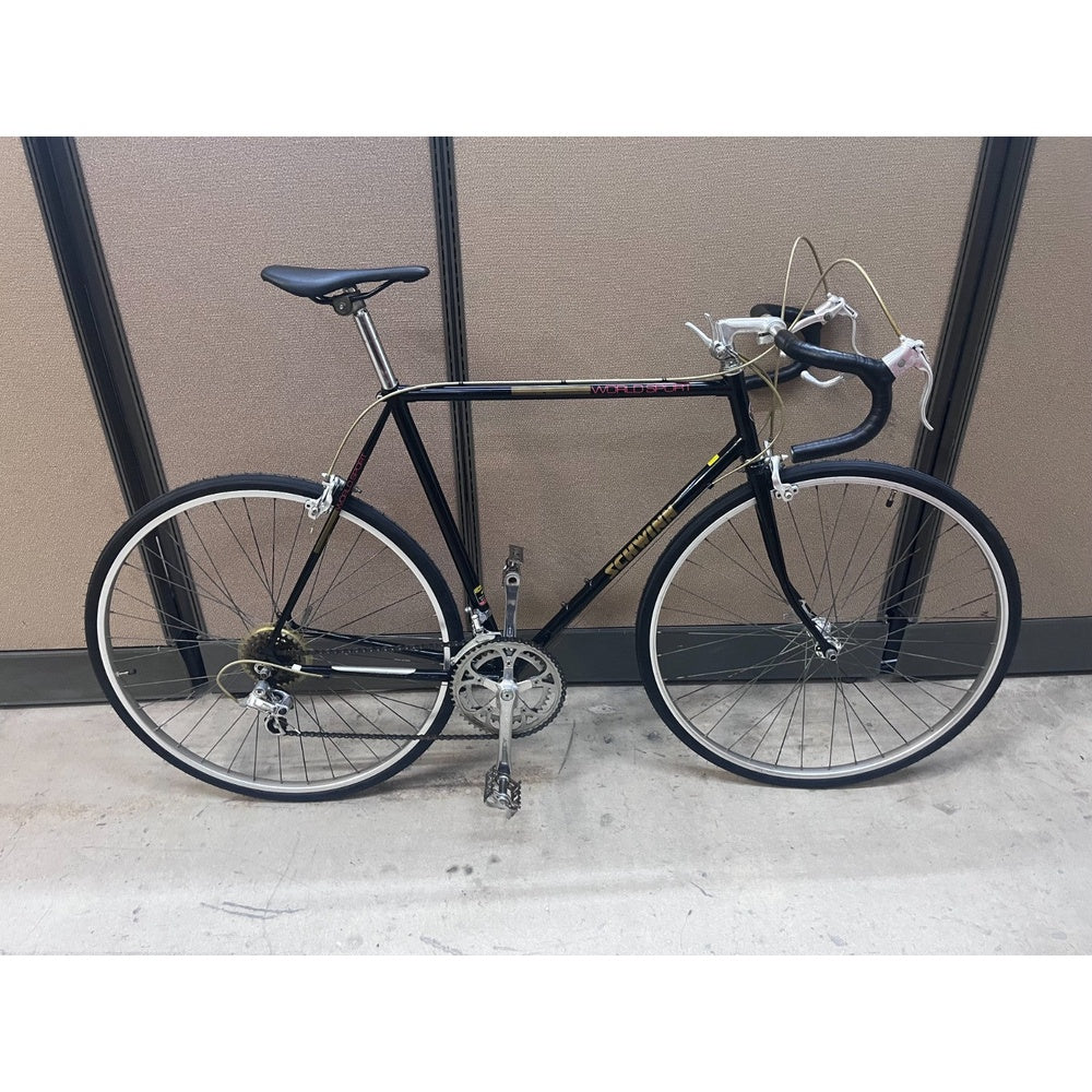 Vintage 1980s Schwinn World Sport 12-speed road bike in black, full side view