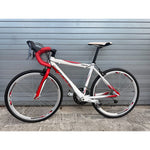 Giordano Libero 1.6 youth road bike in white with red fork, full side view