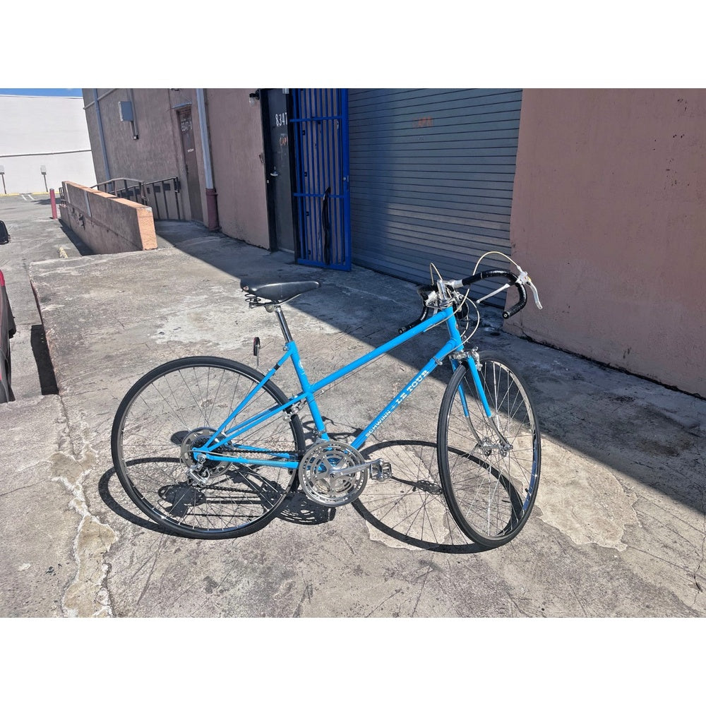 Vintage 1970s Schwinn Le Tour Mixte road bike in blue, full side view