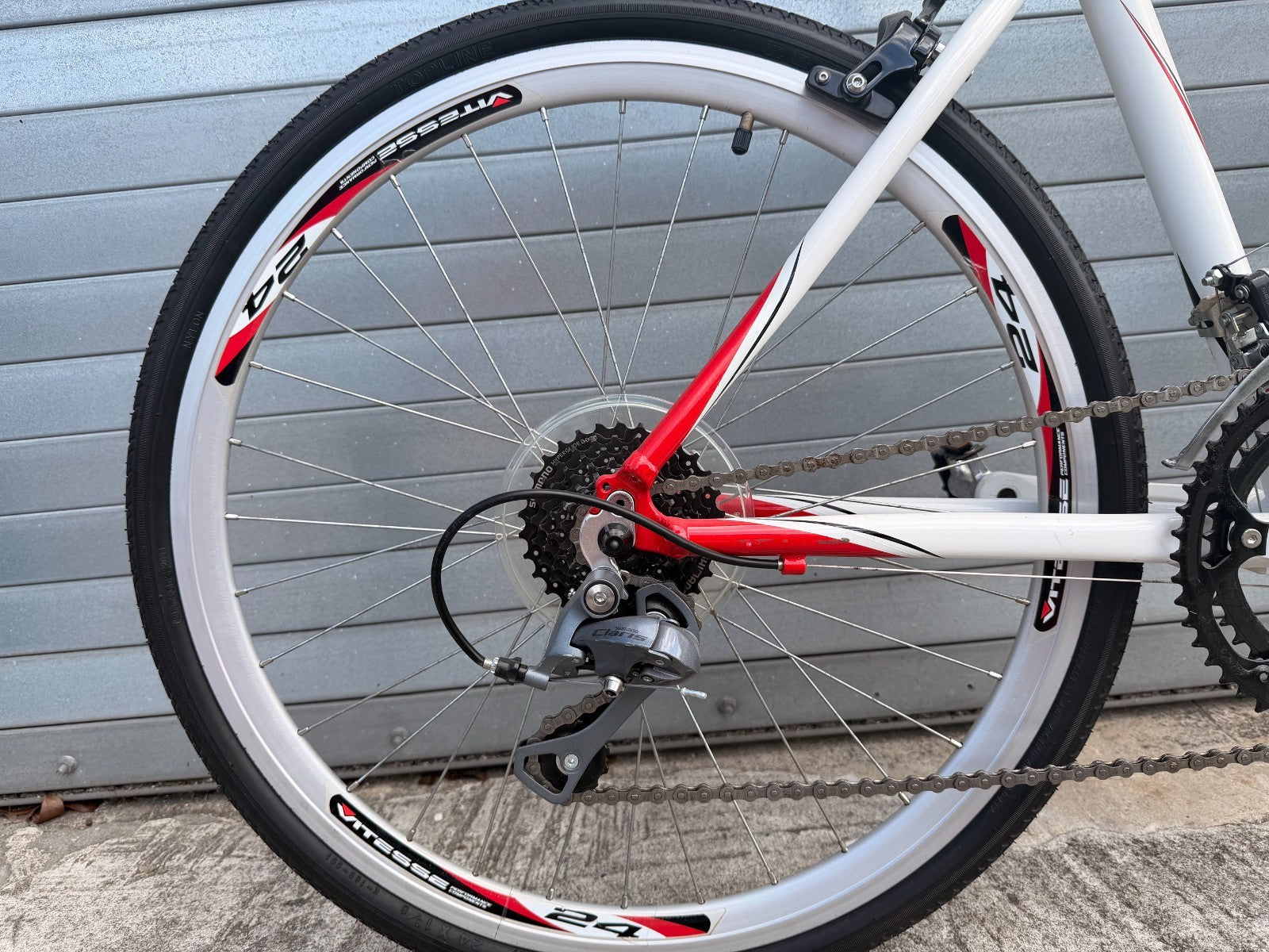 Vitesse 24 alloy wheel and Tektro caliper brake on youth road bike