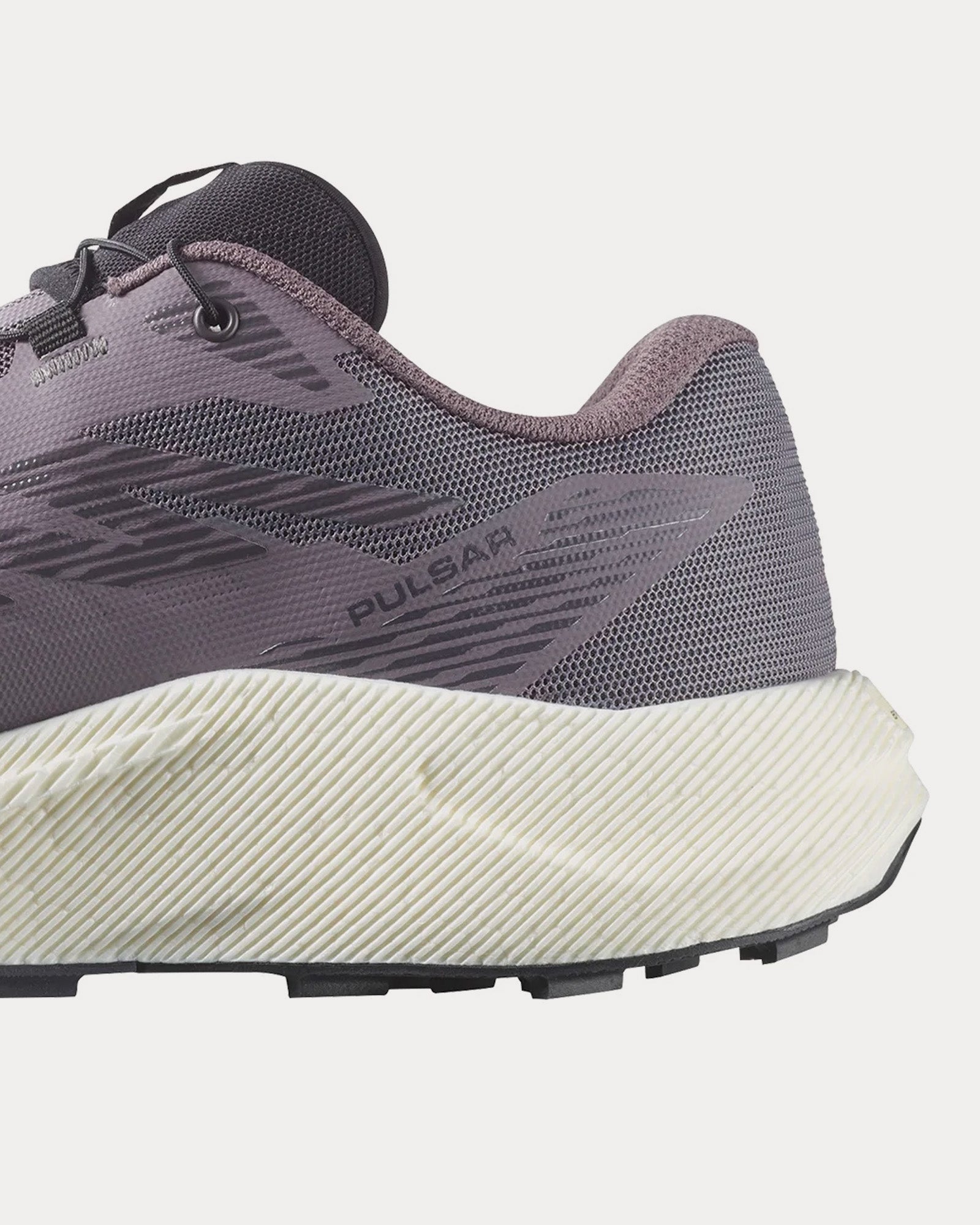 Salomon Pulsar women's running shoe in purple-grey with cream midsole, side profile view