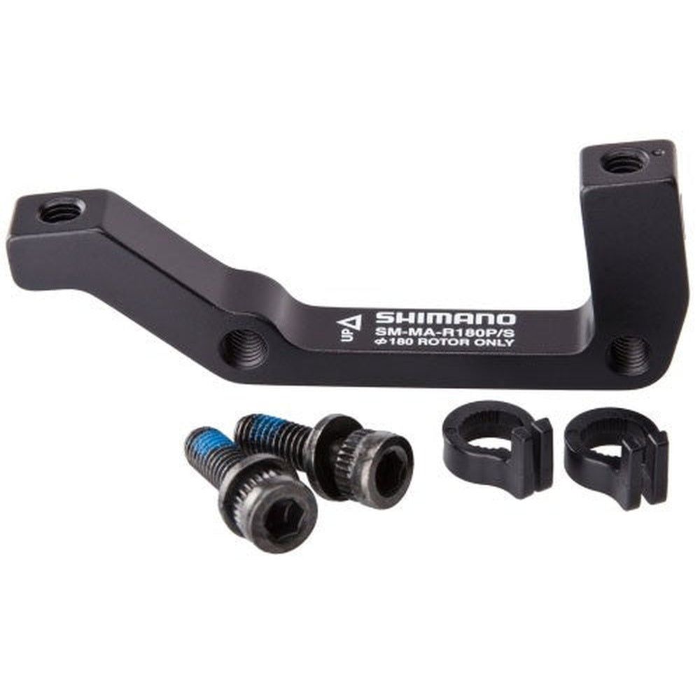 Shimano black disc brake caliper mount adapter with mounting hardware and spacers