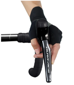 Shimano Dura-Ace ST-R9270 left brake lever held in gloved hand on handlebar