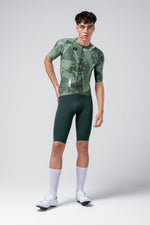 Gobik Attitude 2.0 short sleeve cycling jersey in Crash colorway with geometric green pattern