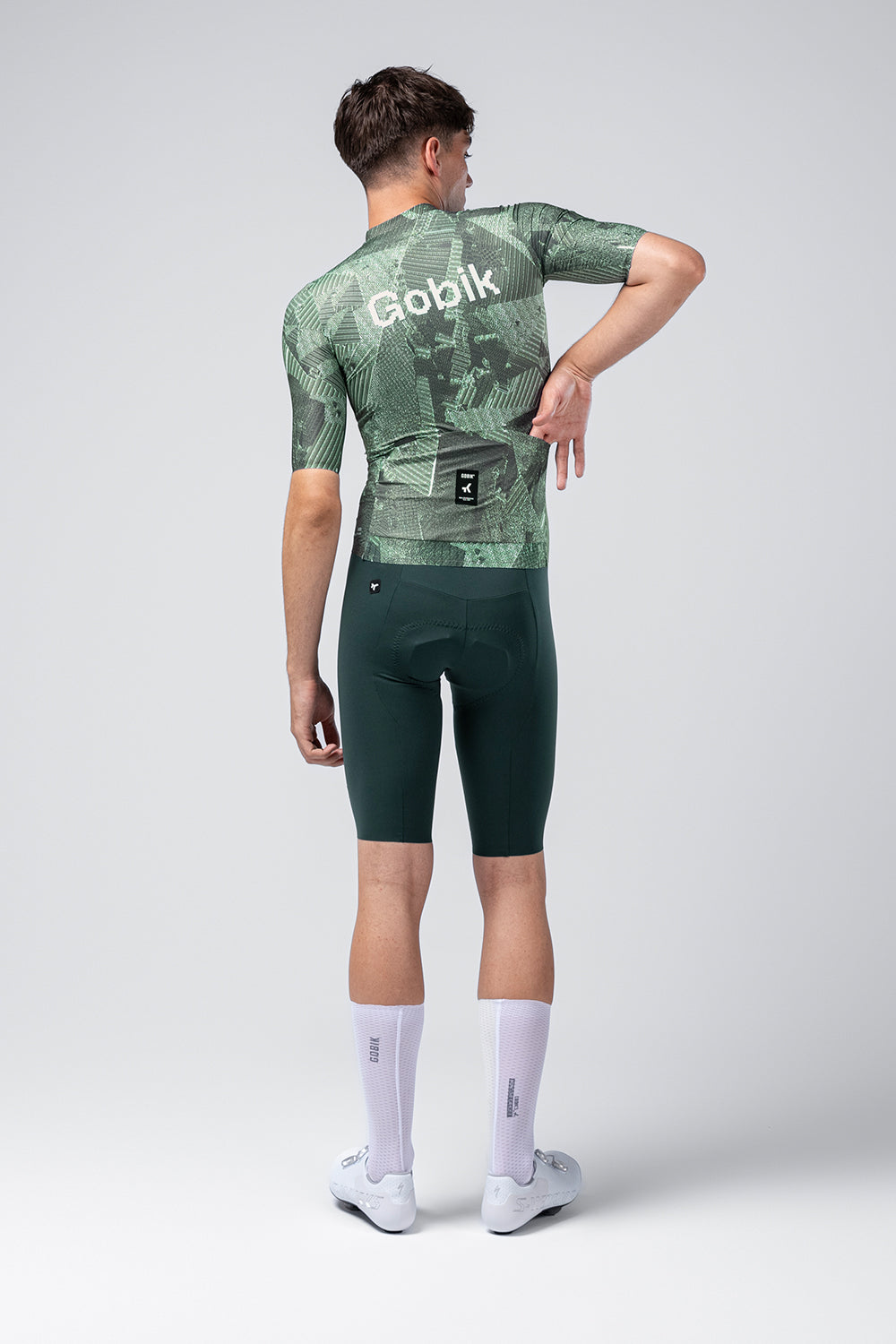 Gobik Attitude 2.0 short sleeve cycling jersey in Crash green tropical pattern, back view