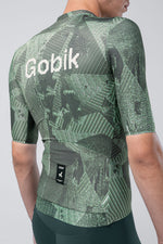 Gobik Attitude 2.0 short sleeve cycling jersey in Crash colorway with geometric green pattern