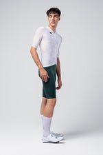 Gobik Attitude 2.0 short sleeve cycling jersey in Lag white colorway with green shorts