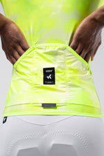 GOBIK Carrera 3.0 cycling jersey in nuclear yellow-green color, back view showing logo