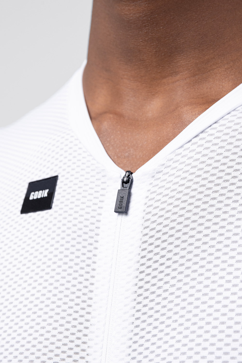 White Gobik Carrera 3.0 cycling jersey with mesh texture and zipper detail