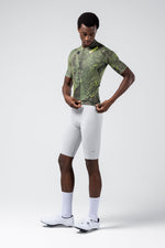 Gobik CX Pro 4.0 cycling jersey in green grid pattern worn by model