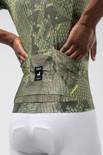 Gobik CX Pro jersey with green digital circuit pattern worn by cyclist