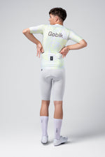 Gobik CX Pro Jersey in white with neon green Amazonian pattern, shown from back