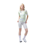 Female cyclist wearing Gobik CX Pro Jersey in Amazonian pattern with cycling shorts
