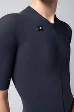 Gobik CX Solid cycling jersey in navy blue with front zip and logo detail