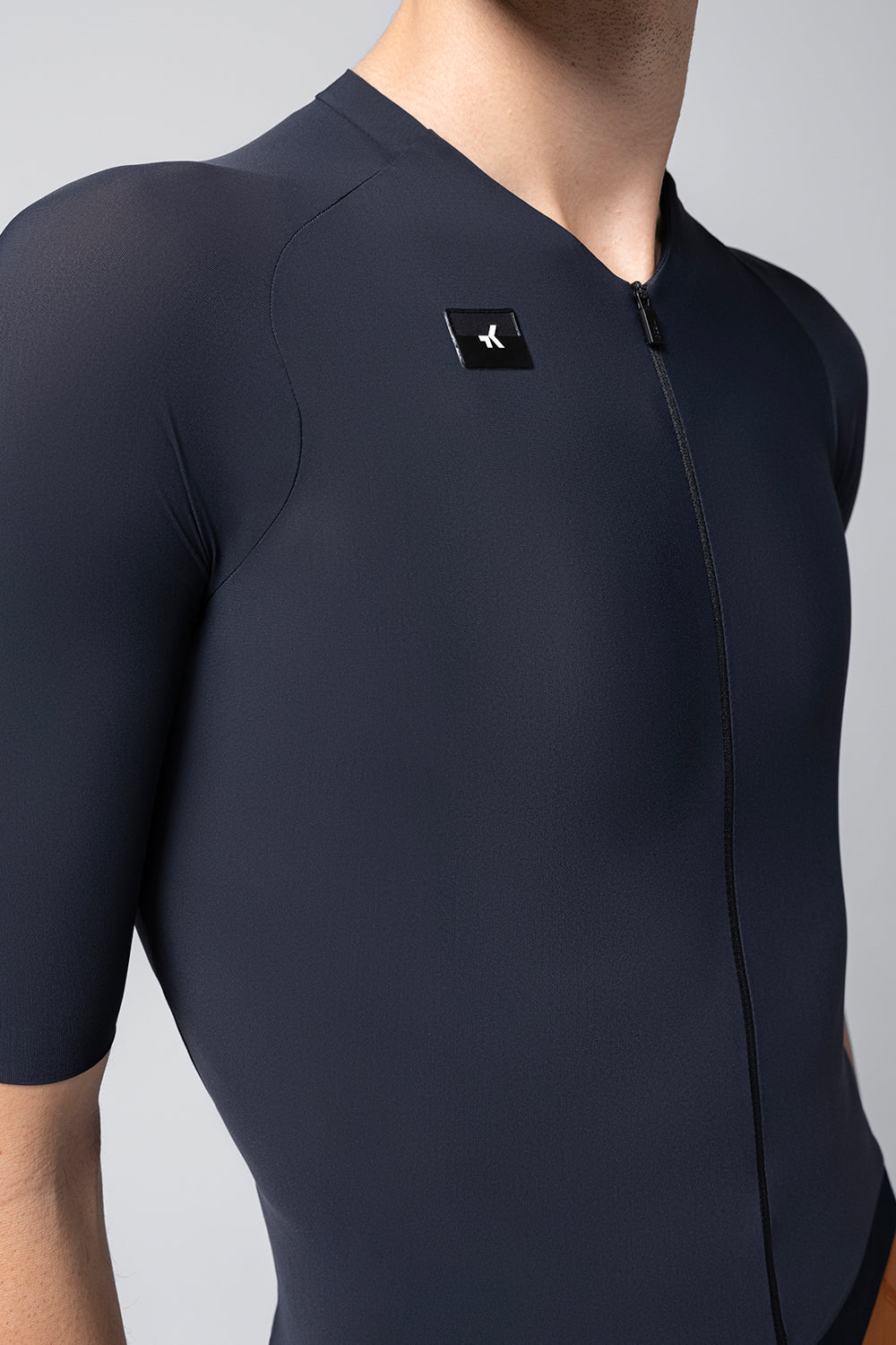 Gobik CX Solid cycling jersey in navy blue with front zip and logo detail