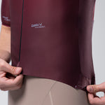 Gobik Magnitude short sleeve cycling jersey in Barossa burgundy color with professional studio lighting