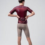 Gobik Magnitude short sleeve cycling jersey in Barossa burgundy color, rear view