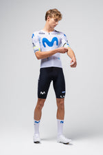Male cyclist wearing white Gobik Nexflow jersey with blue Movistar team design