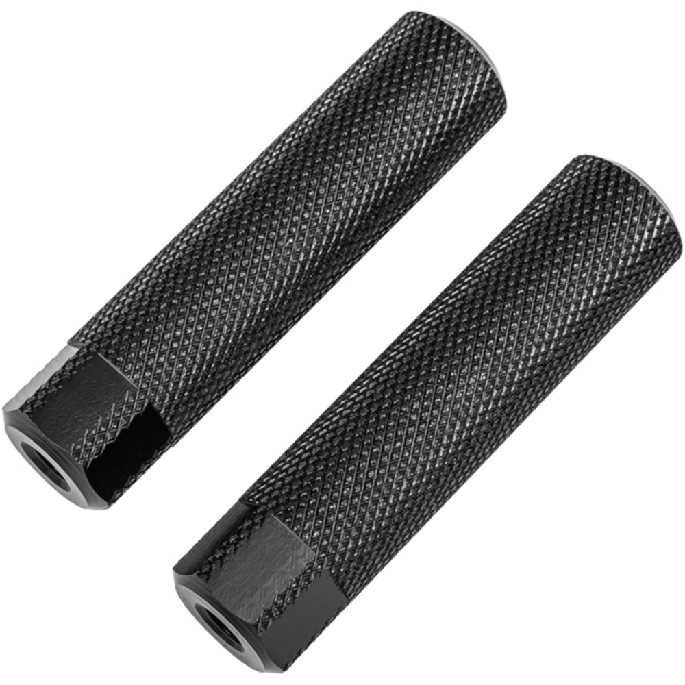 Two black carbon fiber textured bicycle foot pegs on white background