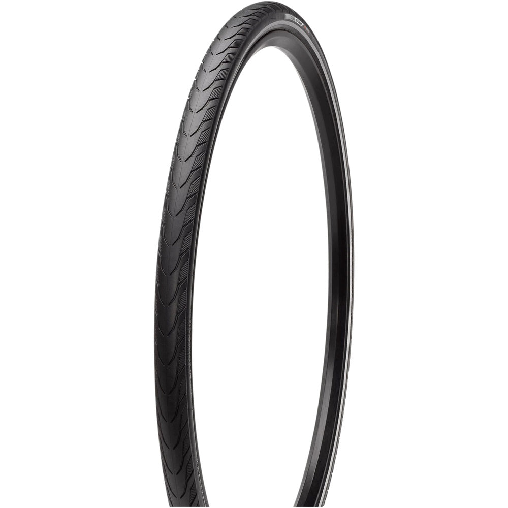 Black Specialized bicycle tire with chevron tread pattern on white background