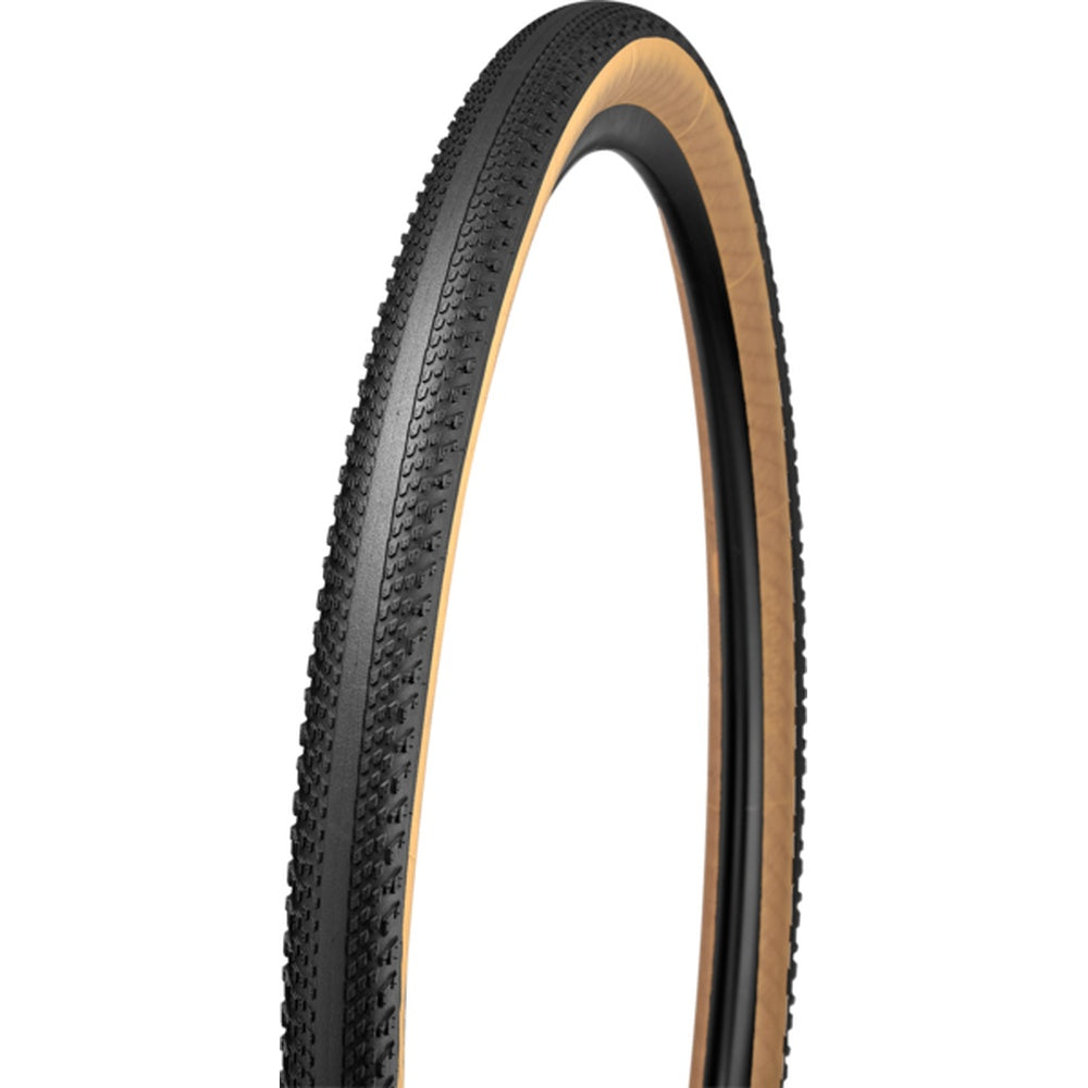 Specialized Pathfinder gravel tire with black tread and tan sidewall