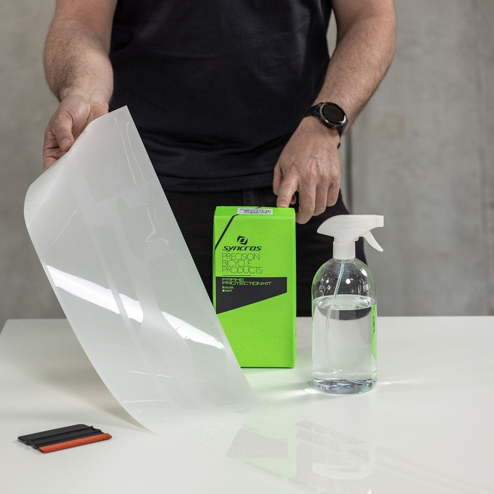 Syncros frame protection kit with clear transparent film, spray bottle and installation tools