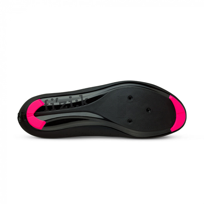Bottom view of Fizik Tempo Overcurve R5 cycling shoes showing black sole with pink accents