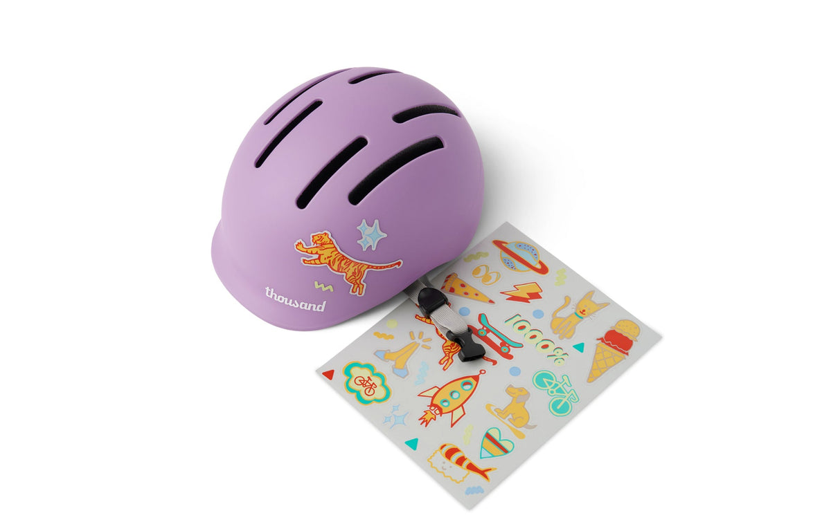 Thousand toddler bike helmet in matte purple with tiger sticker and sticker sheet included