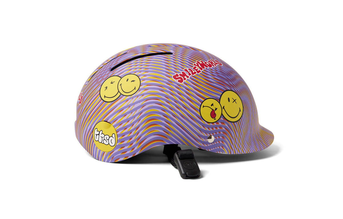 Thousand Next Youth Helmet in lavender sunset with SmileyWorld psychedelic wavy pattern and yellow emoji faces