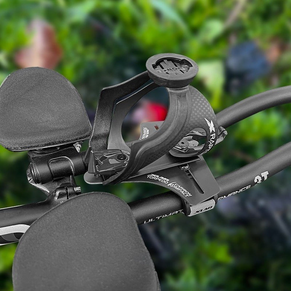 Black XLAB Torpedo Kompact 500 Lite hydration system mounted on triathlon bike aerobars