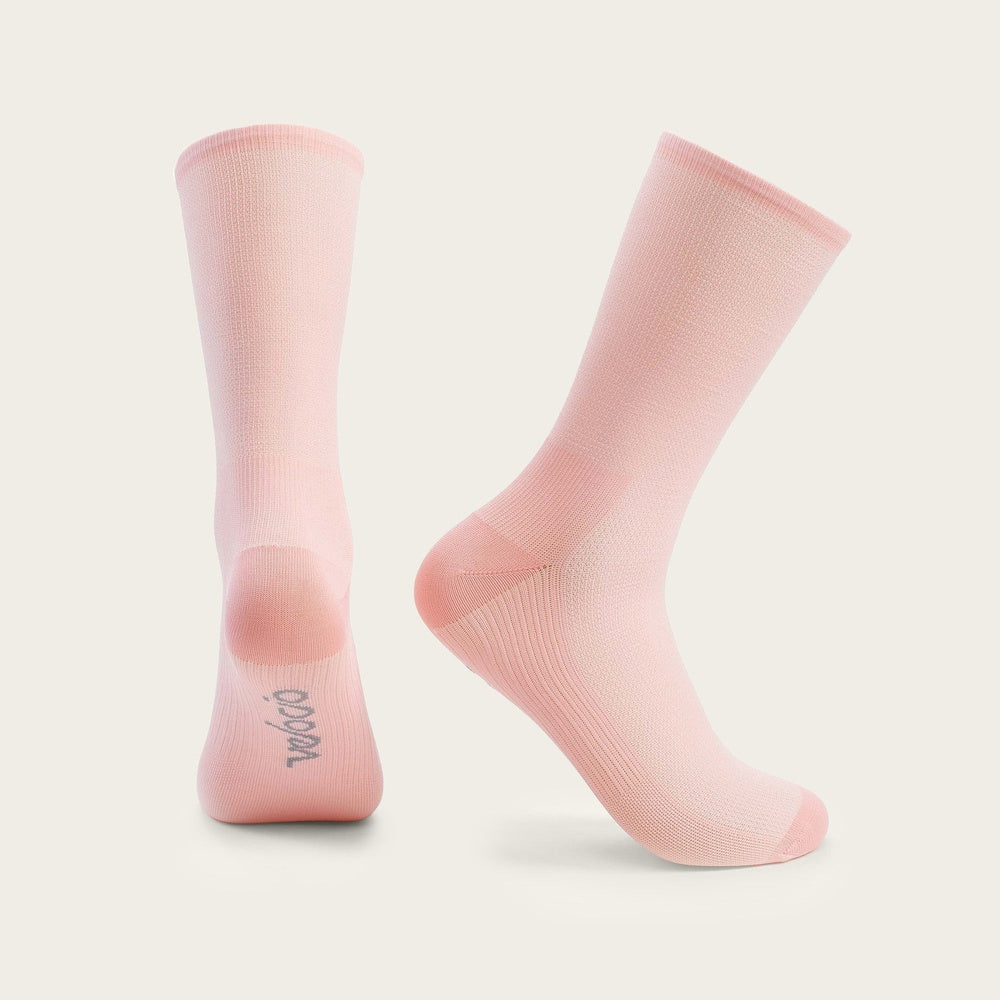 Velocio Ultralight socks in misty rose pink color against clean white background