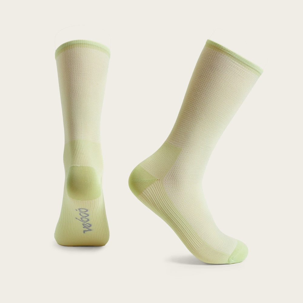 Velocio ultralight cycling socks in olive green gradient colorway on clean background