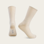 Velocio cream colored ultralight crew socks on clean studio background