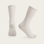 Pair of light beige Velocio ultralight cycling socks on clean background