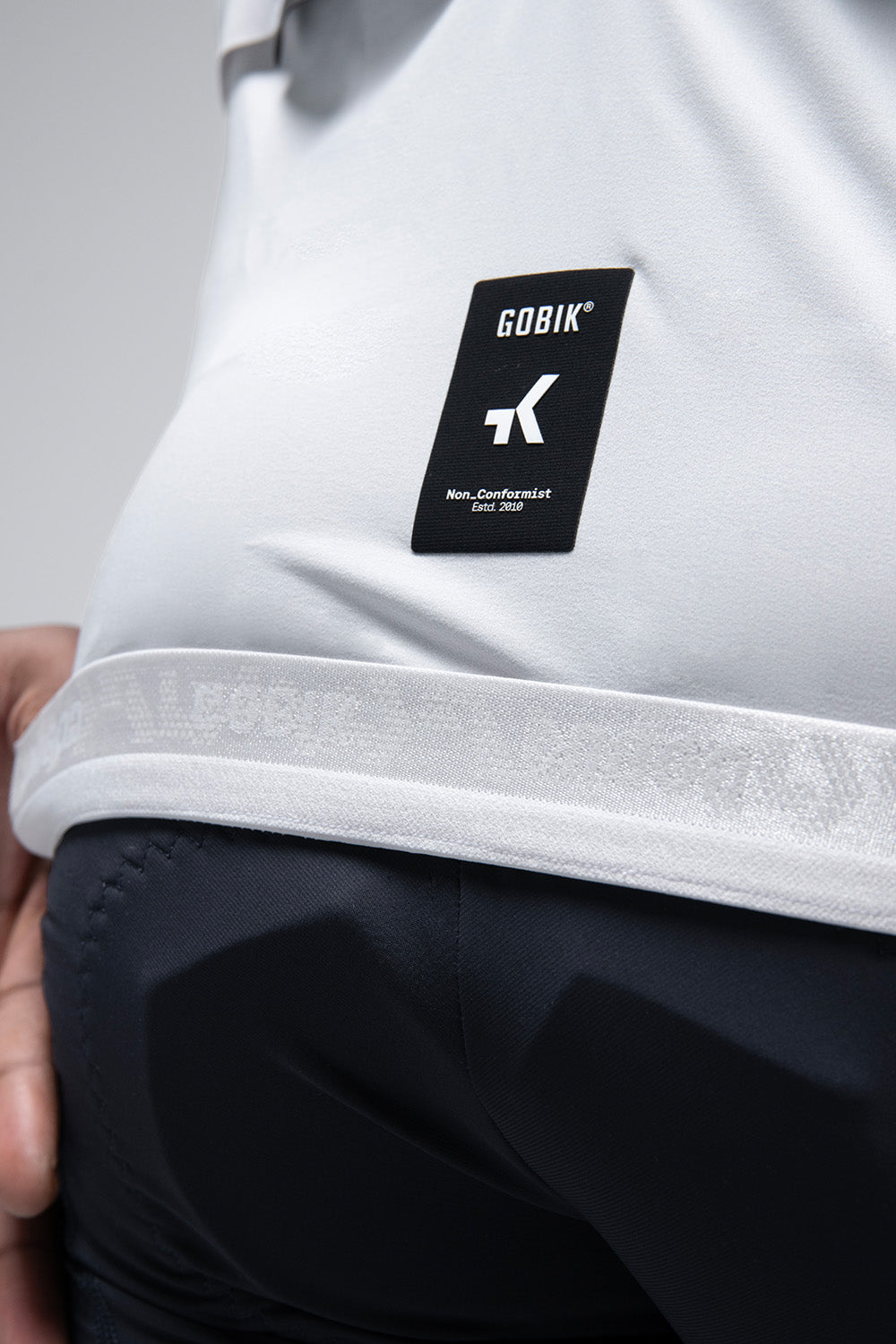 Gobik Vector 2.0 vest in white Athena colorway with black brand label detail