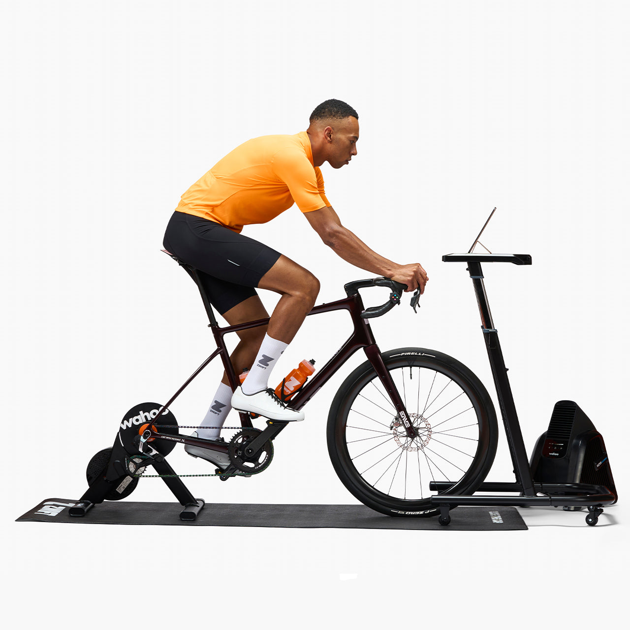 Athlete using Wahoo KICKR CORE 2 smart trainer with bike in studio setting