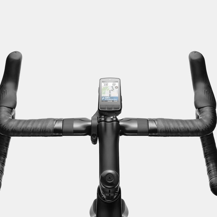 Wahoo ELEMNT BOLT 3 GPS bike computer mounted on black aerodynamic handlebars
