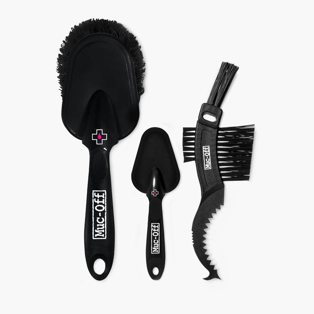 Muc-Off 3x Premium Brush Set with three black cleaning brushes on white background