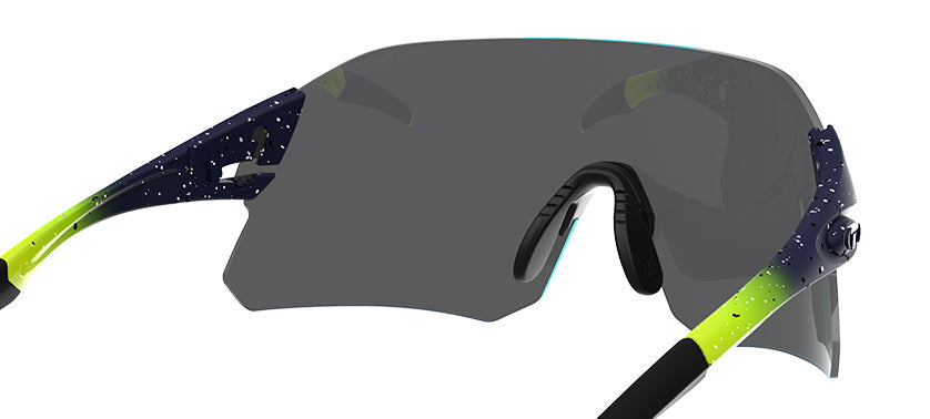Tifosi Rail BlackOut interchangeable sunglasses with dark lens and neon green temple accents