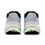 On Cloudsurfer running shoes in mineral blue with aloe green sole, rear view