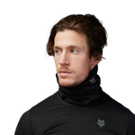 Man wearing black Fox Racing Polartec neck gaiter on white background
